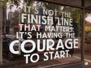 Shop window with statement "It's not the finish line that matters, it's having the courage to start"